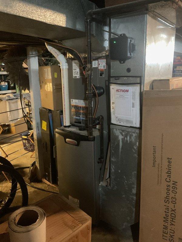 Responded to service call for A/C leaking issue on recently installed system. Upon inspection, discovered condensate drain line obstruction preventing proper drainage. Cleared plugged drain line, verified proper water flow, and tested system operation to ensure leak was resolved and unit was functioning correctly.