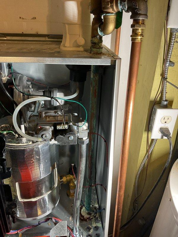 Completed comprehensive boiler cleaning and inspection per maintenance protocol. Identified internal leak within boiler system that is not readily accessible for repair without major disassembly. All heating zones tested and confirmed operational. Replaced batteries in thermostats using customer-supplied batteries to ensure proper system operation.