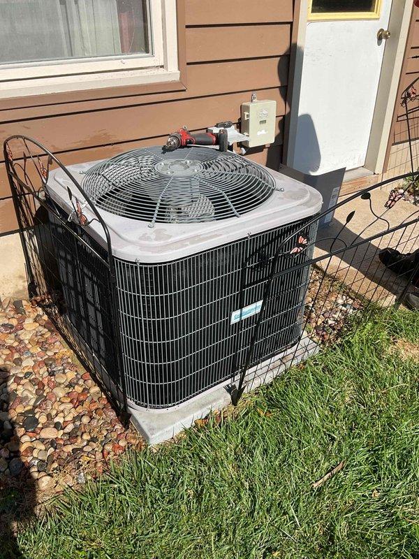 Responded to a no-cooling complaint with the condenser fan not running. Diagnosed a failed start capacitor and a dirty condenser coil. Replaced the capacitor, washed the condenser coil to restore airflow and heat rejection, and verified refrigerant charge was within specification. System restored to normal operation.
