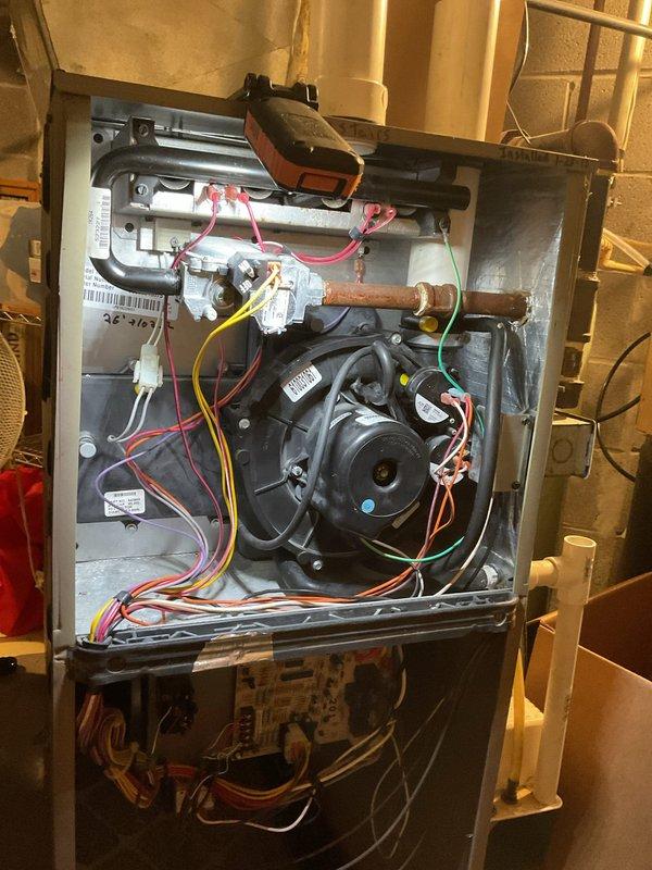 Performed annual cleaning and safety inspection on a Lennox Elite furnace. Cleaned the flame sensor, serviced the condensate drain trap, and tightened electrical connections. Verified proper operation through a full heating cycle, with carbon monoxide readings measured at 28 ppm.
