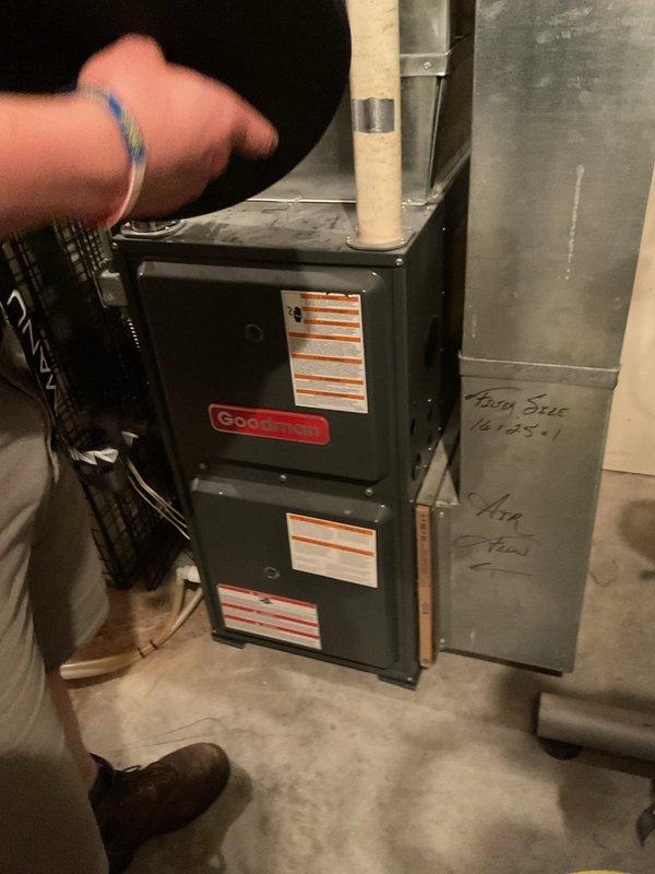 Performed a furnace tune-up on a Goodman gas furnace: cleaned and inspected the unit, cleaned the condensate drain trap, and tightened electrical connections and the flame sensor. Verified normal heating operation, measured elevated carbon monoxide (~140 ppm), and adjusted gas pressure to optimal levels; CO remained high after adjustment and requires further diagnosis.