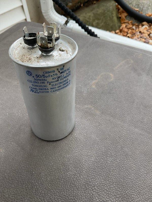 Responded to a no-cooling complaint on a Goodman condenser and diagnosed a failed 50/5 µF, 440VAC dual run capacitor. Replaced the defective capacitor, restoring proper condenser operation and cooling. Cleaned the unit and completed an inspection of the furnace, which was found to be operating normally.