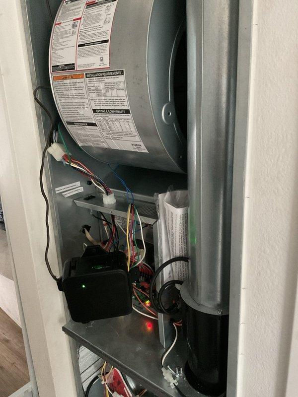 Responded to a reported no-cooling complaint on a recent new installation and connected a digital refrigerant manifold to evaluate system operation. Refrigerant readings on the R454B system were within acceptable range (approximately 102 psig low side, 237 psig high side, 20.5°F subcooling), and the air handler blower speed was reduced to correct the airflow and cooling performance issue. The system was confirmed operating properly at completion.
