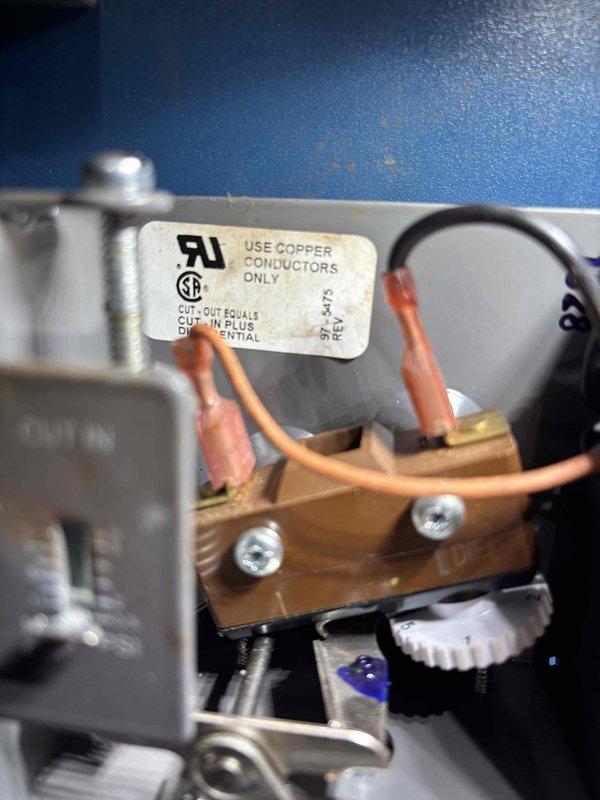 Replaced the boiler sight glass and installed a new pressure gauge. The old gauge snapped off at the fitting, so the corroded, rust-packed remainder was drilled out and the port re-threaded with a tap to accept the new gauge. Both the new gauge and the existing pressure control (pressuretrol) gave inaccurate readings, with the gauge showing 5 psi on a dry system. The pressuretrol tab was adjusted to restore operation, but actual cut-out pressure could not be verified, so further diagnosis and gauge or control replacement are recommended.