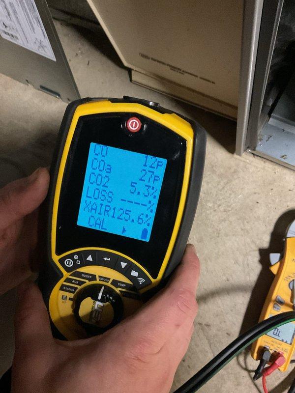 Responded to a no-heat call on a 2022 Lennox gas-fired furnace, verifying operation with the smart thermostat and performing a basic cleaning and safety check of the unit. Combustion analysis was performed with a handheld analyzer, showing CO at 12–14 ppm, CO2 at 5.3%, and O2 at 11.6%, confirming the furnace is firing and operating within safe combustion parameters. Electrical measurements were taken with a clamp meter, and the furnace was left operating normally.