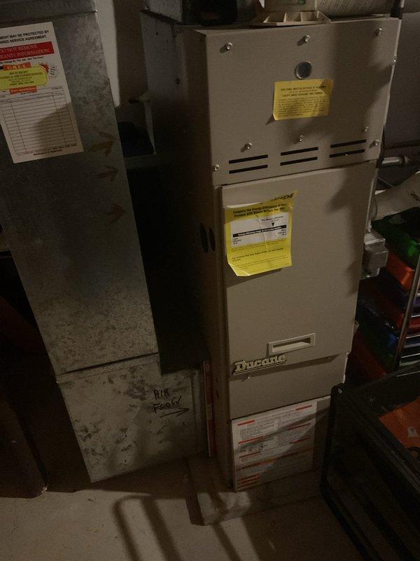 Responded to a no-cooling complaint on a 1985 A/C system that was tripping the fuse at the disconnect. Inspected the Ducane gas furnace/air handler, ductwork, and associated condensate drain, gas, and electrical connections, and found no visible rust, frost, or major damage at the indoor unit. The repeated fuse failure indicates an electrical fault in the aged outdoor condensing unit, likely a shorted compressor, failed capacitor, or shorted contactor. Given the system's age, further diagnosis and repair or replacement options are recommended.