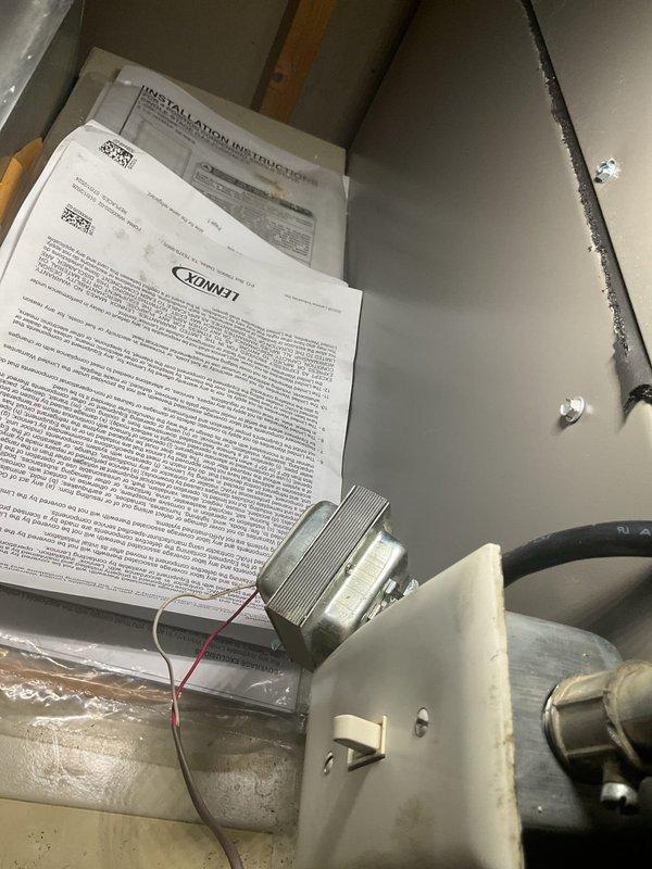 Responded to a blank thermostat complaint on a newly installed Lennox furnace and inspected the control circuit, including the 24V control transformer and its low-voltage connections, to restore power to the T6 thermostat. Verified transformer terminal connections and thermostat wiring, corrected the fault, and confirmed the thermostat display and furnace operation.