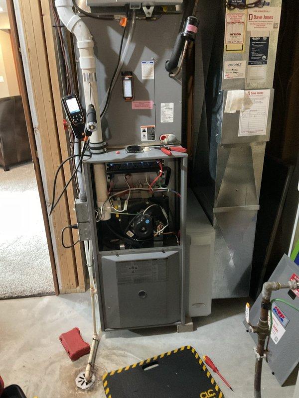 Performed a furnace tune-up, including cleaning and a full operational inspection, with combustion analysis and a camera scope of the heat exchanger; the heat exchanger showed no cracks or failures, with rivets in place, and the unit tested within normal temperature rise specifications. Cleaned and serviced the Aprilaire 700 series humidifier. Discussed furnace replacement options with the homeowner, who will follow up when ready.