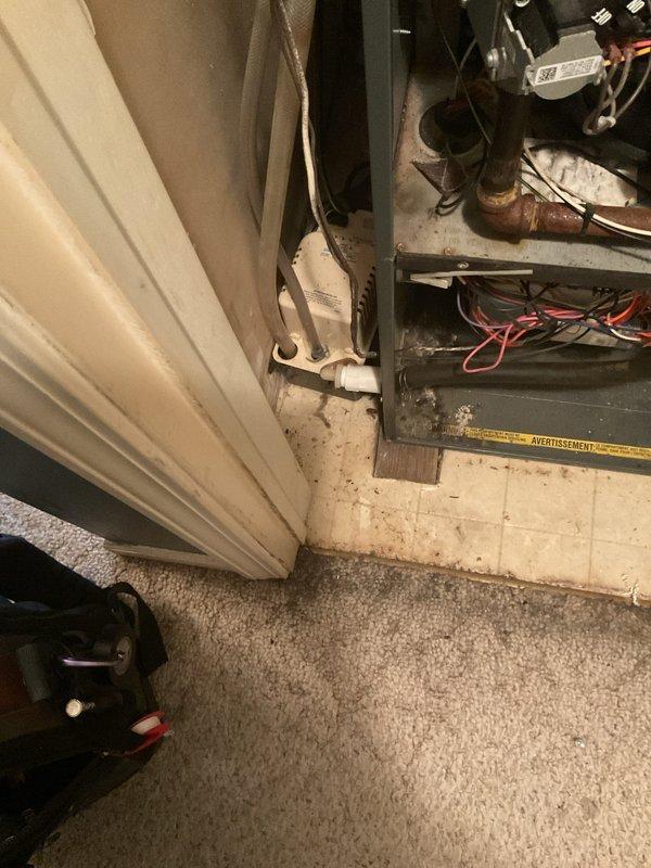 Performed a tune-up on a 2016 Goodman gas-fired furnace, including cleaning and inspection of the burner compartment, gas piping, wiring, and condensate drain system, and replaced the air filter. Noted surface corrosion on the gas piping and debris buildup around the furnace base, and verified the unit was operating properly upon completion.
