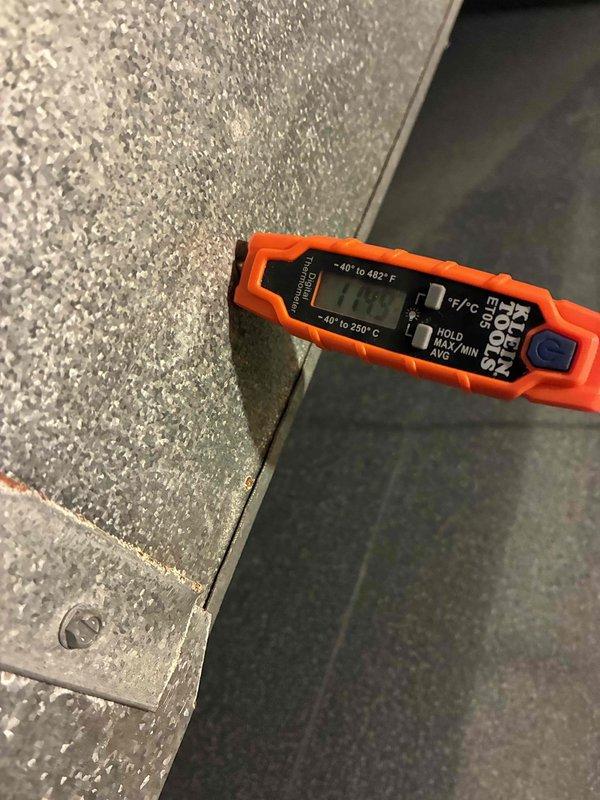 Performed a furnace tune-up, including a full inspection and cleaning of the unit and verification of all major components for proper operation. Measured supply and return duct temperatures with a digital thermometer (approximately 119.9°F and 67.4°F) to confirm the system is producing a normal temperature rise across the heat exchanger. The furnace is operating within expected parameters.
