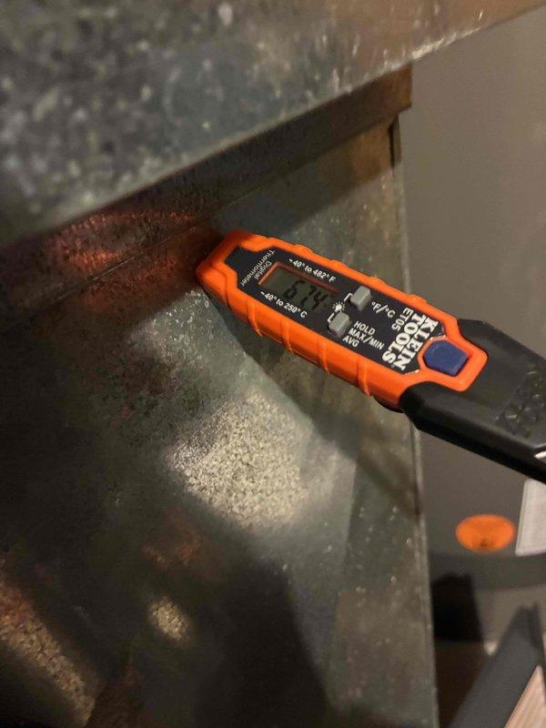 Performed a furnace tune-up, including a full inspection and cleaning of the unit and verification of all major components for proper operation. Measured supply and return duct temperatures with a digital thermometer (approximately 119.9°F and 67.4°F) to confirm the system is producing a normal temperature rise across the heat exchanger. The furnace is operating within expected parameters.