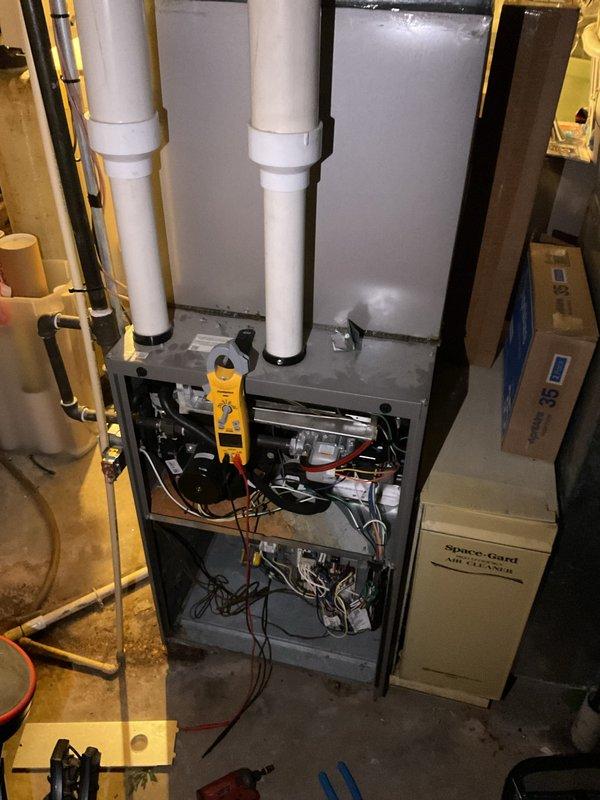 Diagnosed a no-heat condition on a 2015 Lennox gas furnace where the unit initiated a call for heat but shut down immediately with no ignition. Testing with a clamp meter identified a failed gas valve, which was replaced to restore proper gas flow and ignition. System operation was verified following the repair.