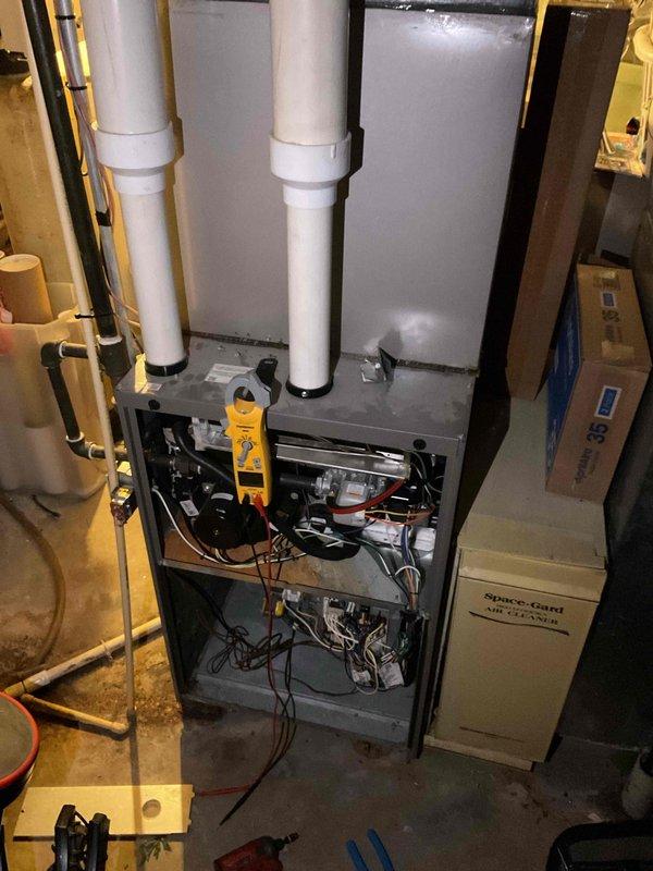 Diagnosed a no-heat condition on a 2015 Lennox gas furnace where the unit initiated a call for heat but shut down immediately with no ignition. Testing with a clamp meter identified a failed gas valve, which was replaced to restore proper gas flow and ignition. System operation was verified following the repair.