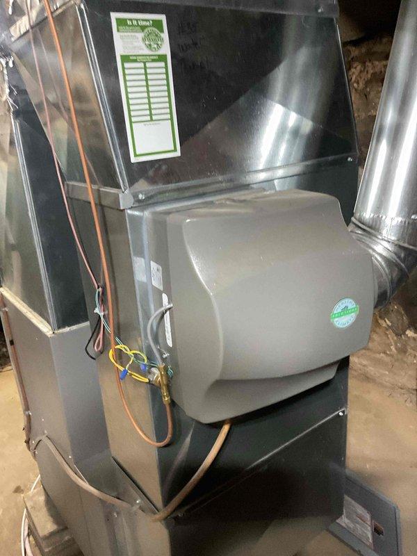Performed a complete cleaning and inspection of the gas furnace, including the burner assembly, heat exchanger, and associated components, and verified the whole-house humidifier and flue connections were intact. Combustion analysis confirmed operation within factory specifications, with a stack temperature of 87.4°F, O₂ at 11.4%, CO at 8 ppm, CO₂ at 5.38%, and efficiency at 95.5%. The unit is operating safely and efficiently with no deficiencies noted.
