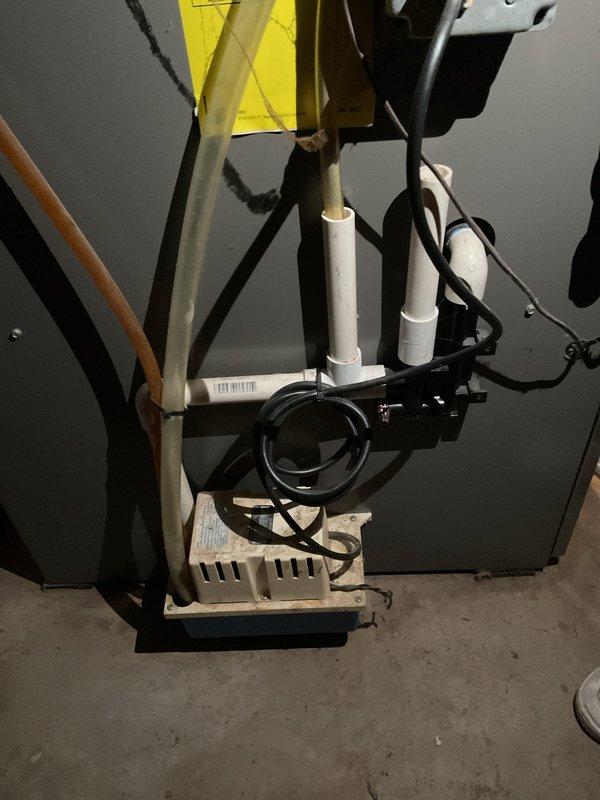 Performed a furnace clean and check, inspecting the unit's condensate drain system, including the condensate pump, PVC drain lines, and associated wiring connections, and verifying proper operation. Replaced the furnace air filter with a new AprilAire MERV 10 filter to improve filtration and airflow.