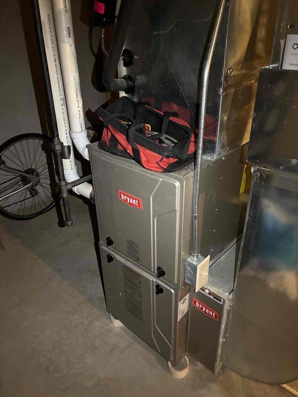 Performed a complete cleaning and multi-point inspection of the Bryant gas furnace, including cleaning the unit and verifying proper operation of its components. The furnace, PVC venting, and associated ductwork and electrical connections were checked and found in good condition, with no rust, frost, or visible damage observed.