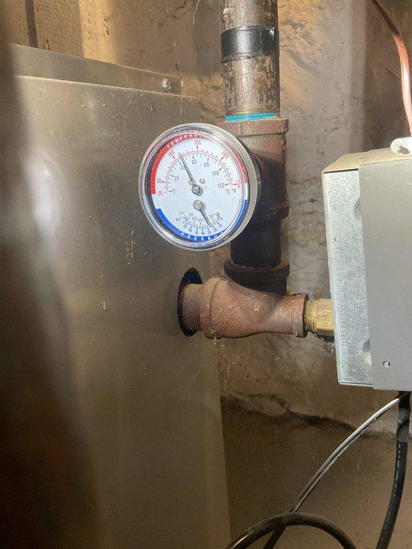 Performed a clean and check on the gas-fired boiler, including inspection of the burner assembly and combustion compartment, flue piping, and barometric damper. Checked the circulator pumps, associated piping and electrical connections, and verified the temperature and pressure gauge operation. Noted surface corrosion on the piping fittings at the boiler's outlet for future monitoring.