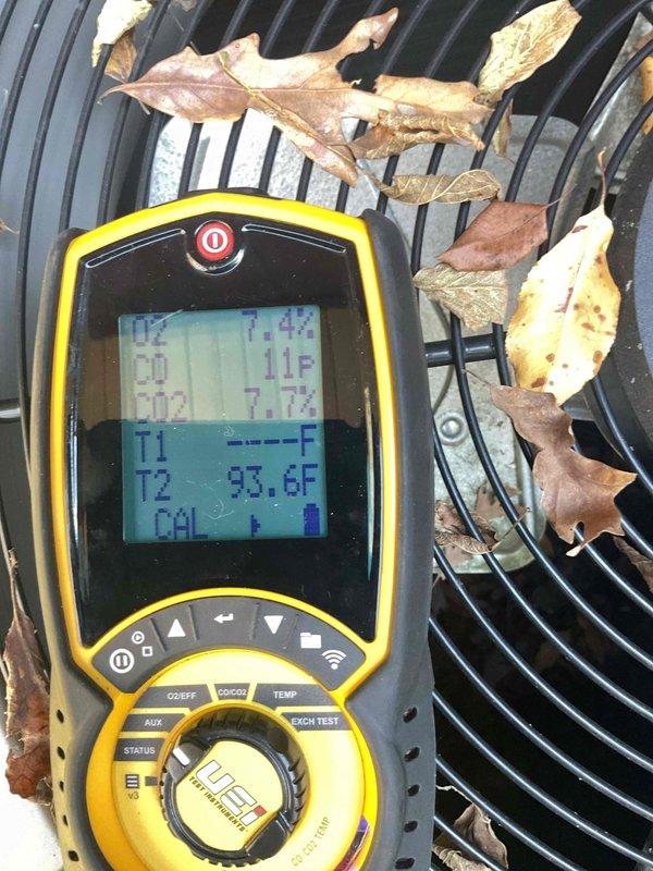 Responded to a no-heat call on a 2012 gas furnace that had not been serviced since installation. Found the flame sensor heavily contaminated and the thermostat batteries depleted, so performed a full cleaning of the unit, including the flame sensor, and addressed the thermostat power issue. After the cleaning, verified normal heating operation with a combustion analysis showing CO at approximately 11 ppm, O2 at 7.4%, and CO2 at 7.7%, confirming the furnace is operating safely and heating properly.