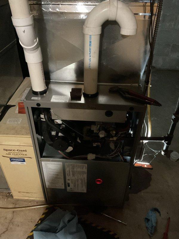 Performed cleaning and safety inspection on two gas furnaces, one on the first floor and one on the second floor, verifying proper operation of each unit. Measured manifold gas pressure on the upstairs furnace, found it slightly elevated, and adjusted it to specification. Completed cleaning and operational checks on both systems.