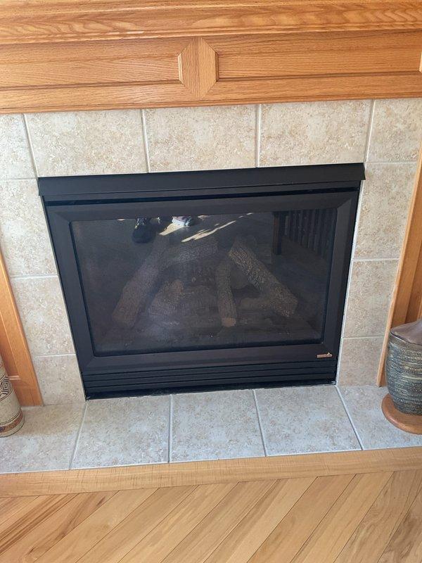 Performed a routine cleaning and safety inspection on a 2015 Lennox gas furnace, including verification of the venting and combustion air PVC piping, ductwork connections, control wiring, and the attached Trion Air Bear air cleaner. Also inspected the gas fireplace insert, finding the glass, ceramic logs, and surround in good condition with no soot, cracks, rust, or visible damage. Both units were left in satisfactory operating condition.