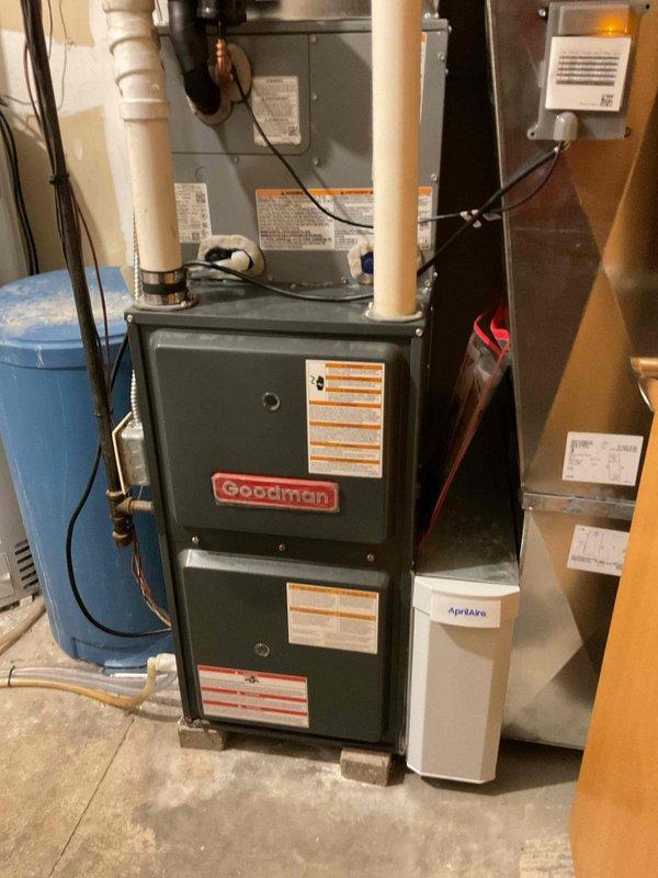 Performed a full tune-up on a Goodman upright gas furnace, including cleaning of the unit and inspection of all major components. Verified the cabinet, PVC venting, wiring, and ductwork connections were intact and operating properly, with no signs of rust, frost, or damage observed. The unit was cleaned and checked, with no deficiencies found.