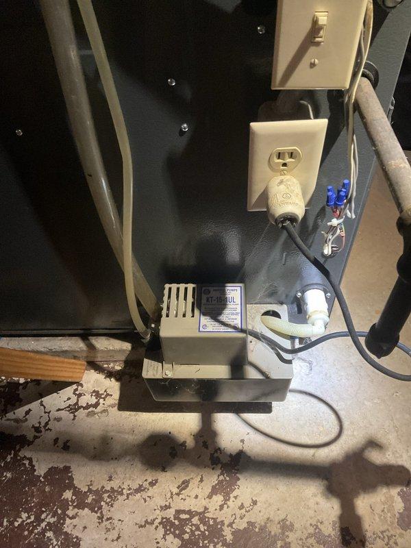 Performed a furnace tune-up and inspection on an upright gas furnace, including inspection of the burner and heat exchanger assembly, gas valve, inducer motor, control board wiring, and PVC vent connections. Inspected the condensate drain system and condensate pump to verify proper drainage, and confirmed the furnace operated correctly through a heating cycle.