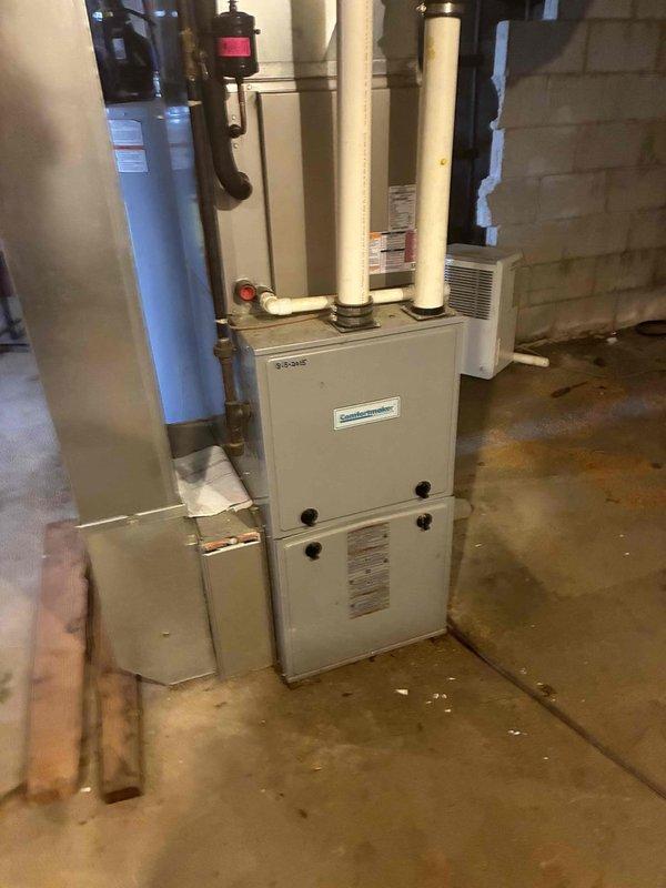 Performed annual maintenance on a Comfortmaker upright gas furnace, including cleaning and a full operational check of the heating system. Diagnosed a failed draft inducer motor, which requires replacement to restore reliable operation. Recommended inducer motor replacement or, alternatively, furnace replacement, per the customer's interest.