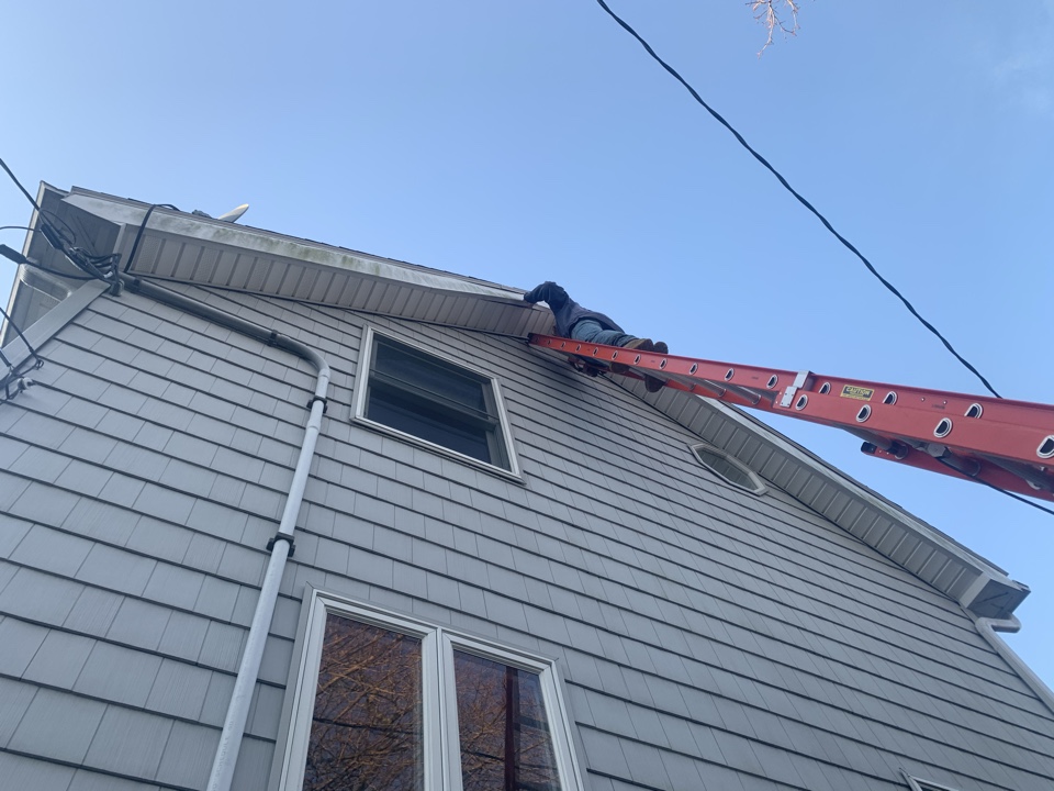 Salem, MA - Securing the fascia metal with finish nails Salem, MA - Securing the fascia metal with finish nails