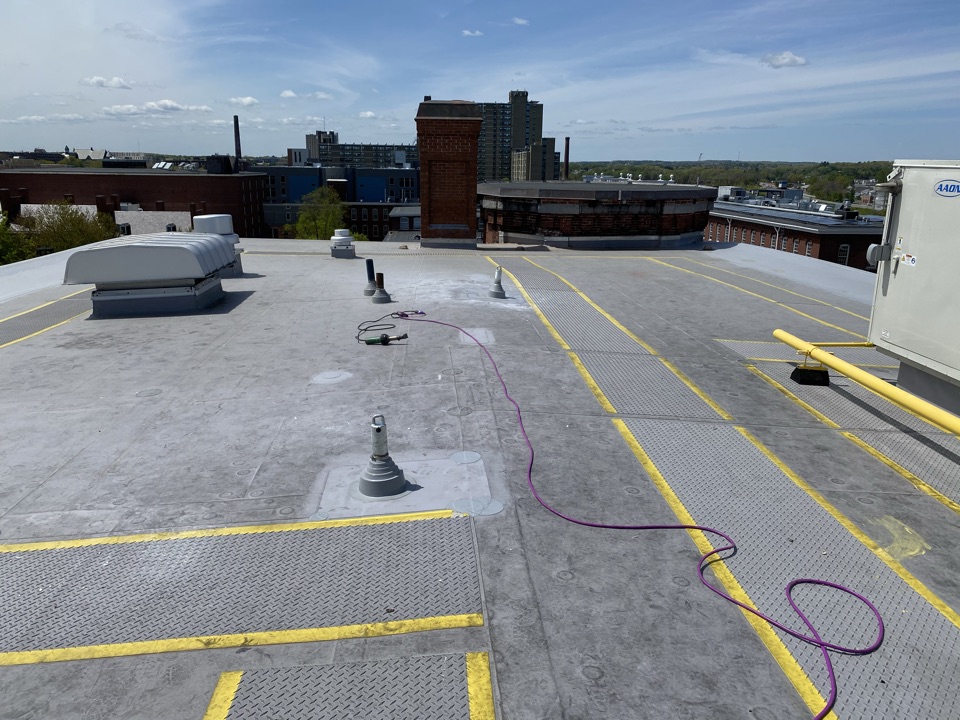 Lowell, MA - Removed insulation and installed two anchors for safety harness on a Carlisle TPO fully adhered roof. Installed anchors to wood deck. Filled insulation around anchors. Cleaned area with cleaner. Installed target patches CARLISLE TPO membrane around anchors and installed Carlisle TPO pipe boots. Lowell, MA - Removed insulation and installed two anchors for safety harness on a Carlisle TPO fully adhered roof. Installed anchors to wood deck. Filled insulation around anchors. Cleaned area with cleaner. Installed target patches CARLISLE TPO membrane around anchors and installed Carlisle TPO pipe boots.