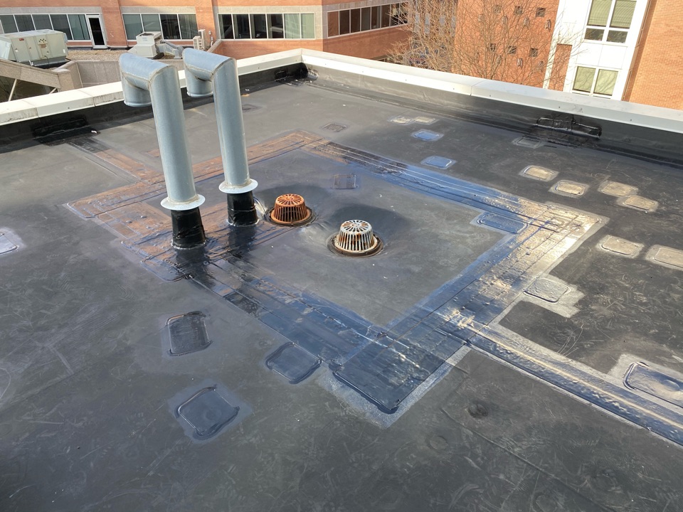 Quincy, MA - Found multiple holes on reinforced epdm roof, cleaned and stripped in all seams, and reflashed all flashing on roof. Cleaned all holes and patched. Lap sealed all work Quincy, MA - Found multiple holes on reinforced epdm roof, cleaned and stripped in all seams, and reflashed all flashing on roof. Cleaned all holes and patched. Lap sealed all work
