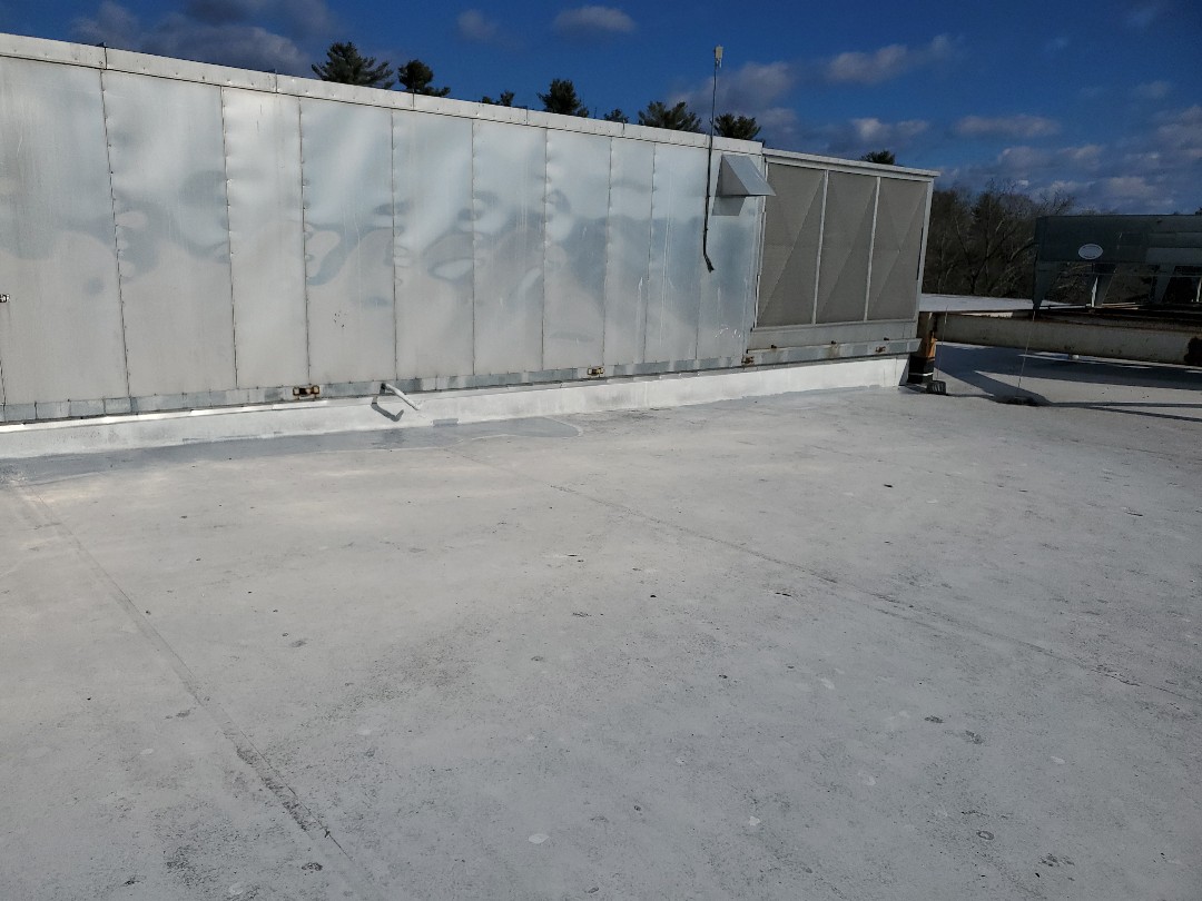 Medway, MA - TPO roof showing scrim and holes patched with gaco Medway, MA - TPO roof showing scrim and holes patched with gaco