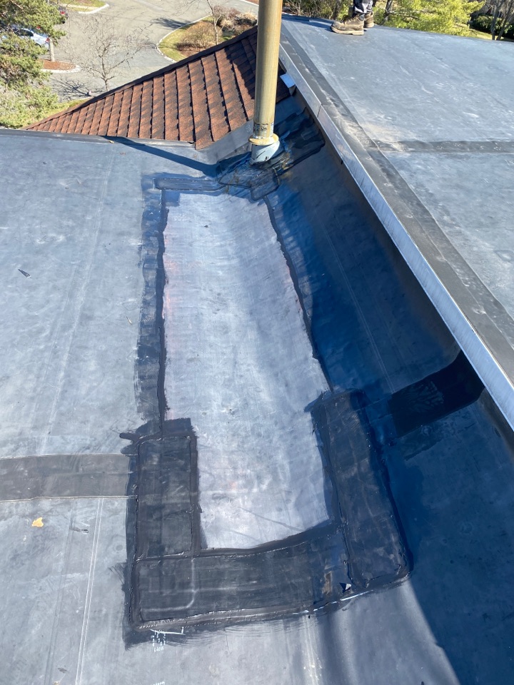 Danvers, MA - Doing a repair on a EPDM roof Danvers, MA - Doing a repair on a EPDM roof