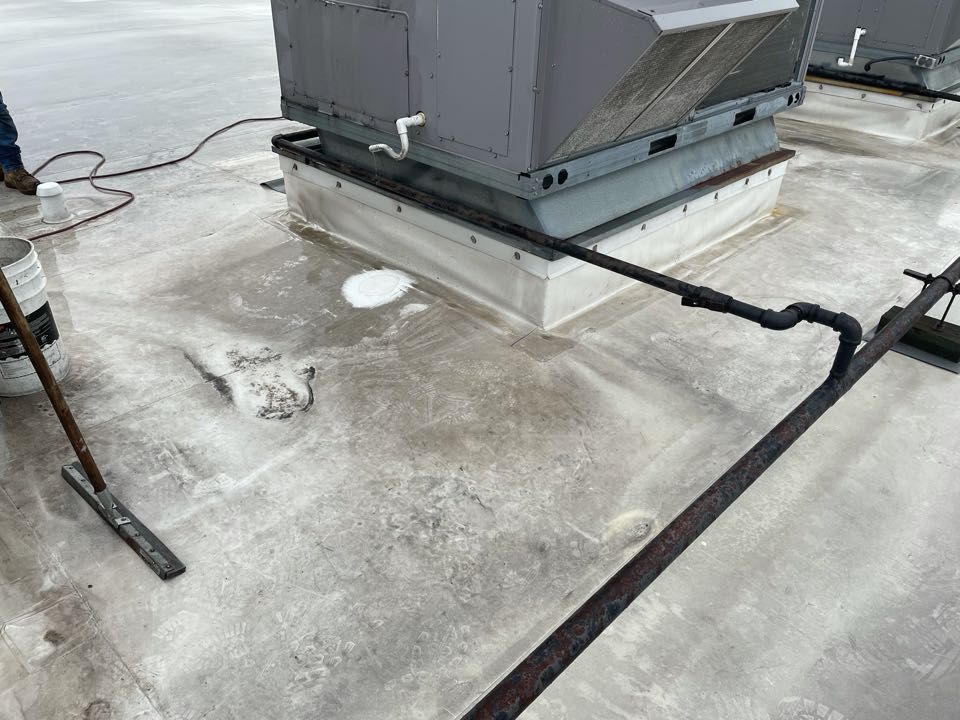 Brookline, MA - Cleaned and patched on hole on a durloast roofing system. Brookline, MA - Cleaned and patched on hole on a durloast roofing system.