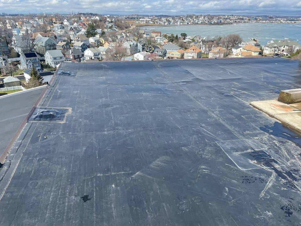 Winthrop, MA - Removed two steel legs, and patched 9 holes on a epdm fully adhered roofing system Winthrop, MA - Removed two steel legs, and patched 9 holes on a epdm fully adhered roofing system