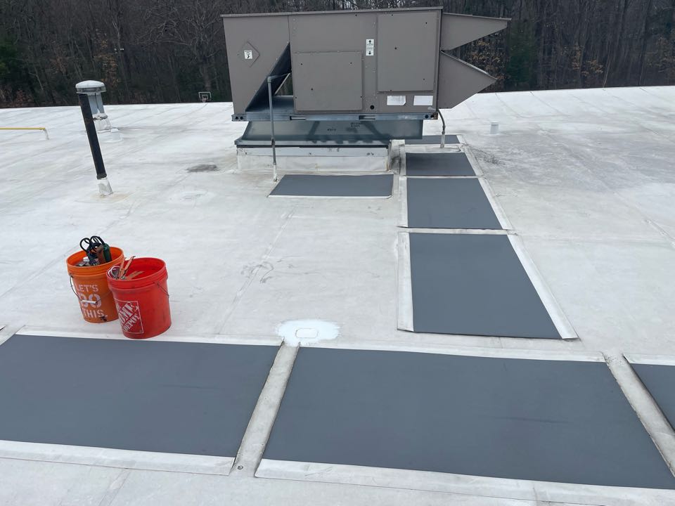 Andover, MA - Cleaned and patched one hole on a durloast roofing system Andover, MA - Cleaned and patched one hole on a durloast roofing system