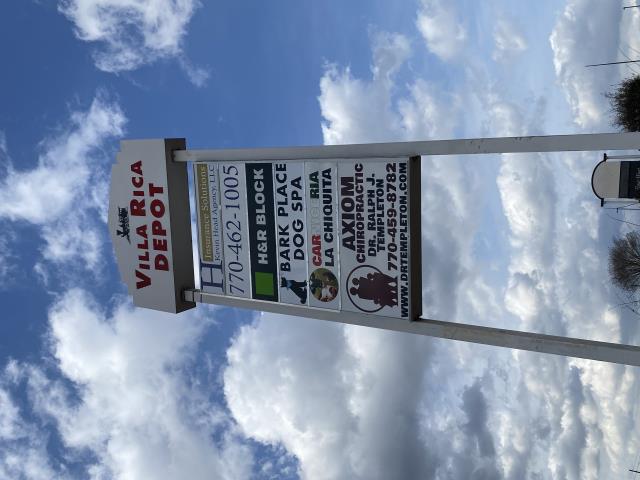 Storfront lightbox and roadside tenant panels 