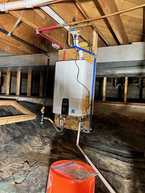 Residential Installation of Amana AC and Navian Tankless Water Heater at a home near Chester Portsmouth Park in Wheat Ridge, Co.