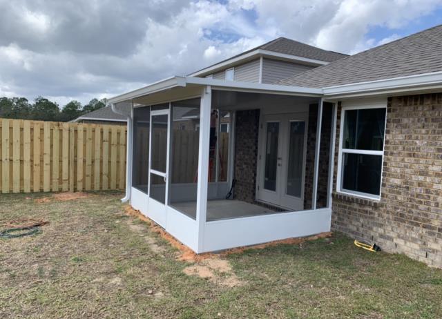 Enjoy your backyard this Spring with a brand new screen room. Our team built this screen room for a customer in Redstone Commons neighborhood, Crestview FL. From pouring the foundation to installing 6" k-style seamless white gutters, giving it that finished look. Looks like this Spring and Summer is going to be cool and dry for this family! Enjoy your backyard this Spring with a brand new screen room. Our team built this screen room for a customer in Redstone Commons neighborhood, Crestview FL. From pouring the foundation to installing 6" k-style seamless white gutters, giving it that finished look. Looks like this Spring and Summer is going to be cool and dry for this family!