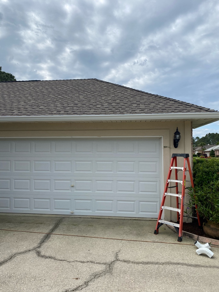 Installing new 6 inch seamless gutters and downspouts almost home in Gulfbreeze Florida Installing new 6 inch seamless gutters and downspouts almost home in Gulfbreeze Florida