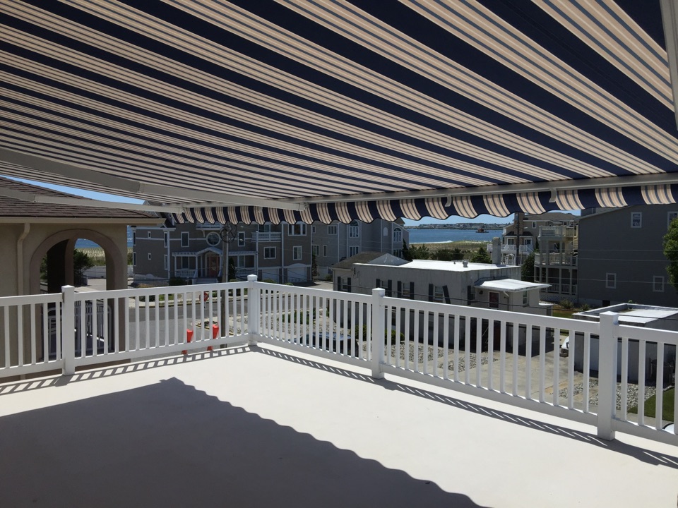Sea Isle City, NJ - Third floor deck with views from bay to beach covered with a motorized retractable awning. Call one of our product specialists and find out how Miami Somers can make your home safer, more comfortable and more enjoyable! (609) 927-4133 Sea Isle City, NJ - Third floor deck with views from bay to beach covered with a motorized retractable awning. Call one of our product specialists and find out how Miami Somers can make your home safer, more comfortable and more enjoyable! (609) 927-4133