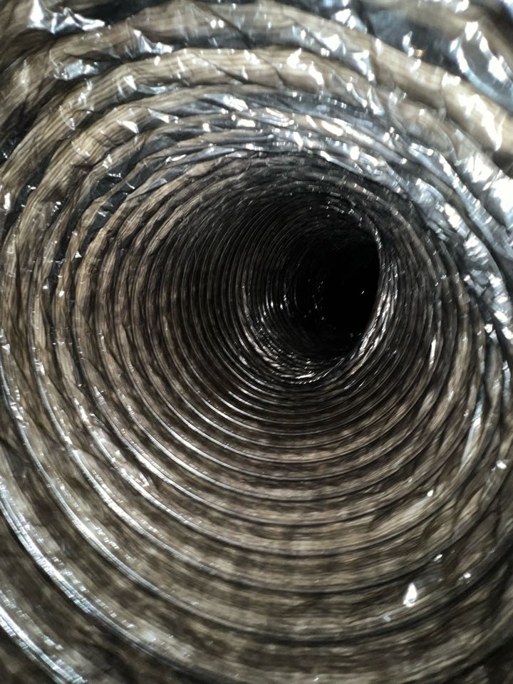 Air duct cleaning on a Rheem 2 system home 