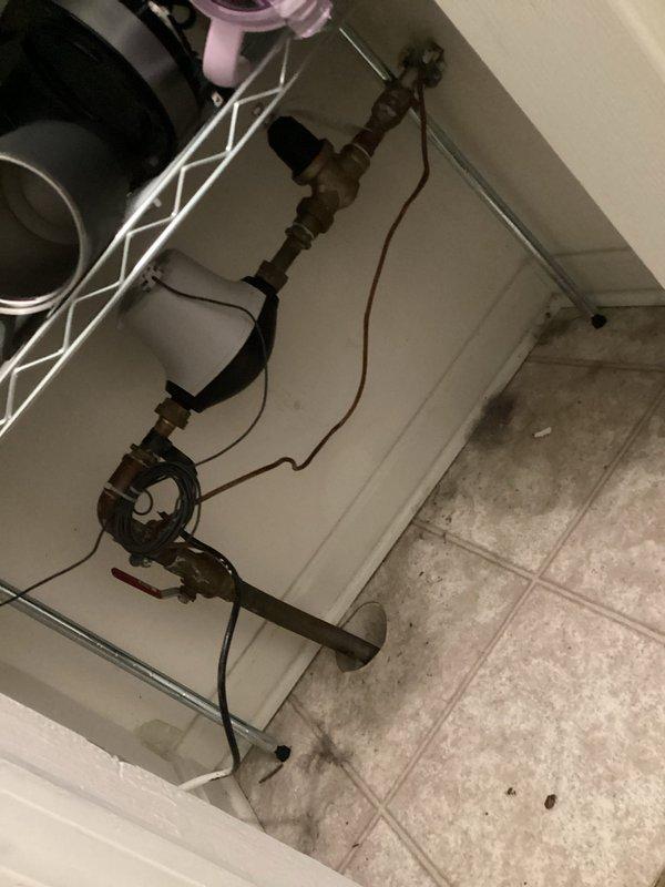 Responded to emergency call for water leakage from A.O. Smith ProLine commercial water heater. Inspection revealed corroded copper pipe fittings at top connection points causing water to spurt from tank. Shut off main water supply, replaced damaged fittings, and verified proper operation of all valves and connections. Tested system after repair with no further leaks observed.