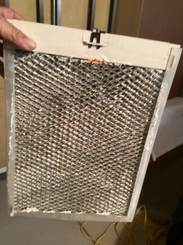 Responded to service call for humidifier inspection. Found humidifier control panel with cracked display screen and significant buildup/corrosion on housing components. Inspected and cleaned air filter which showed moderate dust accumulation but remains serviceable. Humidifier requires replacement of control interface to restore proper functionality. System will remain operational until 2025 MVP.