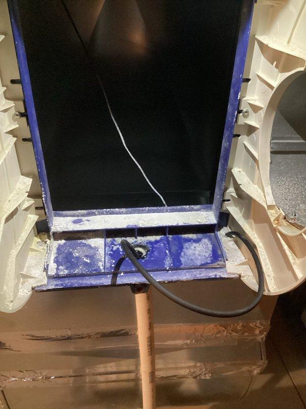 Responded to service call for humidifier inspection. Found humidifier control panel with cracked display screen and significant buildup/corrosion on housing components. Inspected and cleaned air filter which showed moderate dust accumulation but remains serviceable. Humidifier requires replacement of control interface to restore proper functionality. System will remain operational until 2025 MVP.