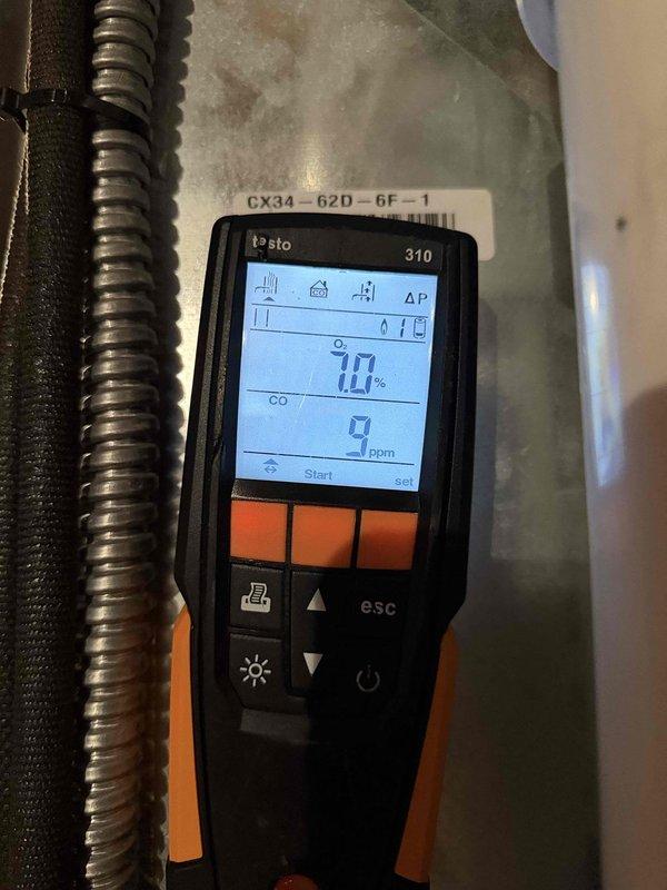 Performed annual residential heating maintenance service on 1-year-old system. Replaced one 20x25x4 media filter and one #35 water panel. Conducted combustion analysis with Testo 310 analyzer, confirming safe CO levels (1.3-9 ppm) and proper system operation at 70% efficiency.