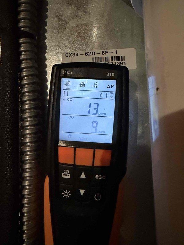 Performed annual residential heating maintenance service on 1-year-old system. Replaced one 20x25x4 media filter and one #35 water panel. Conducted combustion analysis with Testo 310 analyzer, confirming safe CO levels (1.3-9 ppm) and proper system operation at 70% efficiency.
