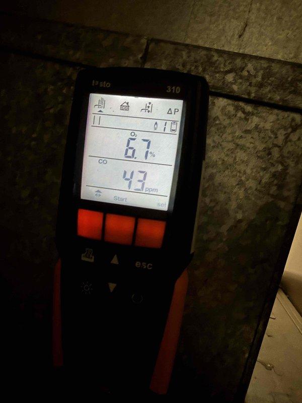 Performed routine maintenance tune-up on 22-year-old Lennox furnace. Conducted combustion analysis using Testo 310 analyzer, which revealed elevated carbon monoxide readings between 43-64 ppm. Measurements also indicated 6.7% oxygen level, suggesting combustion efficiency issues that require attention.