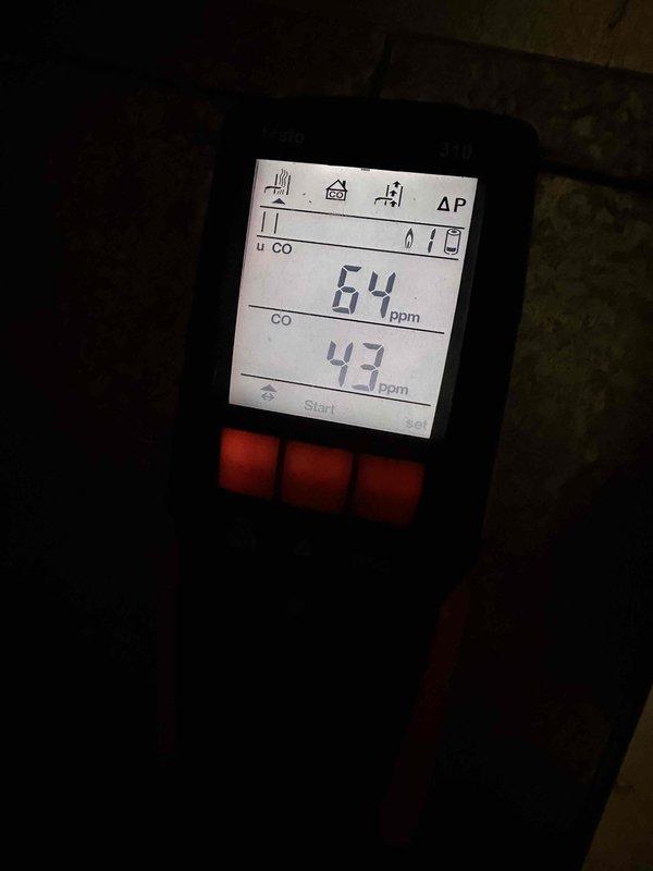 Performed routine maintenance tune-up on 22-year-old Lennox furnace. Conducted combustion analysis using Testo 310 analyzer, which revealed elevated carbon monoxide readings between 43-64 ppm. Measurements also indicated 6.7% oxygen level, suggesting combustion efficiency issues that require attention.