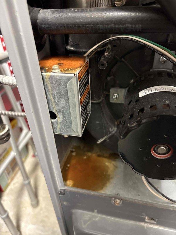 Performed Fall/Winter preventive maintenance on heating system. Conducted combustion analysis with readings showing 7.9% oxygen, 12 PPM CO, 7.3 CO2, and 93.6% efficiency for the high-efficiency natural gas unit. Noted significant corrosion and water damage on control module housing and unit floor requiring future attention.