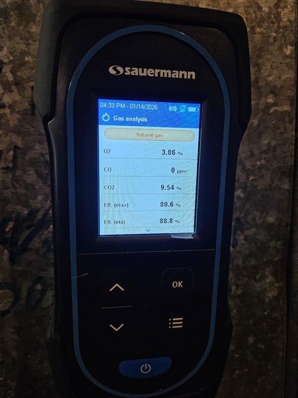 Performed annual maintenance tune-up on 30-year-old furnace. Conducted combustion analysis with Sauermann analyzer, which showed acceptable oxygen levels (3.86% and 1.98%), CO readings (0-46 ppm), and CO2 levels (9.54%-10.57%). System operating at 80.6-82.7% efficiency, which is within expected range for equipment of this age.